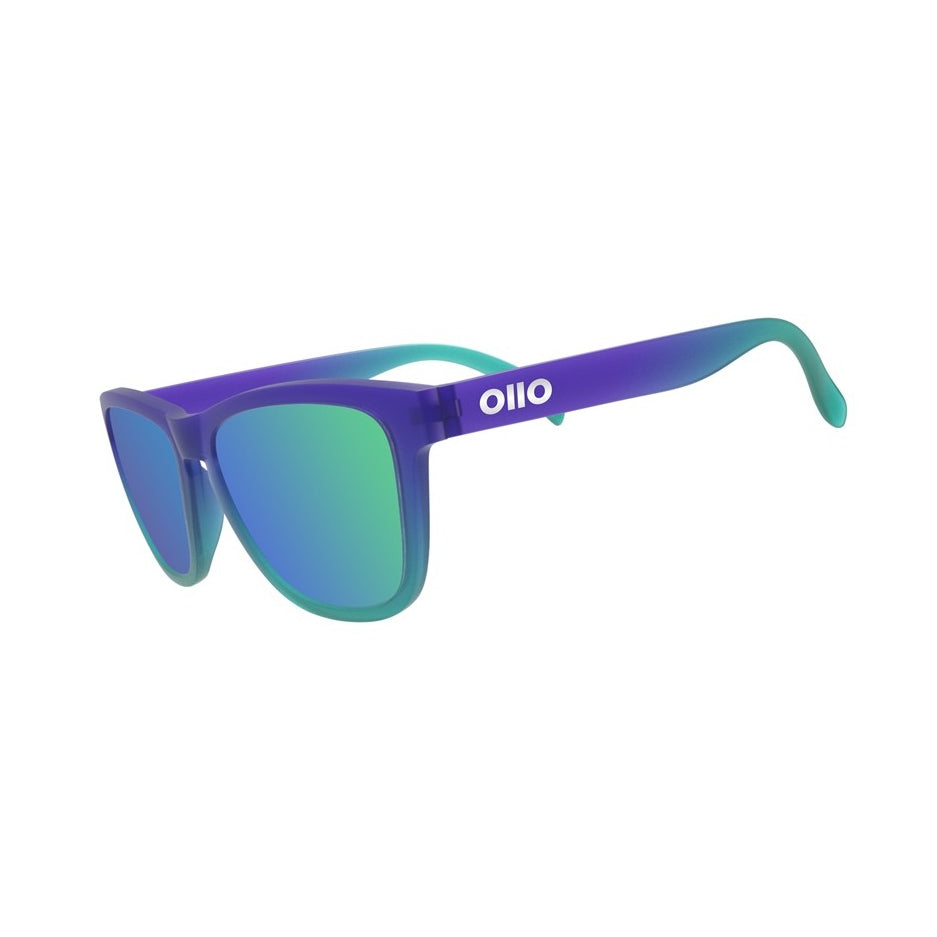 Ollo Clásico Ocean Pulse sunglasses with UV400 polarised lenses and a sleek blue frame. Perfect for running, cycling, and outdoor adventures, these lightweight, durable sport sunglasses provide non-slip comfort and high-contrast vision for athletes and active lifestyles