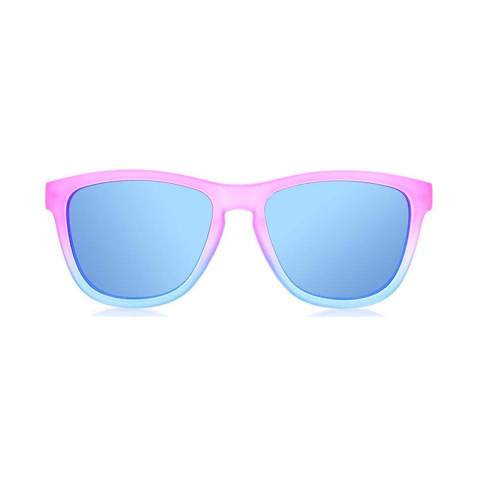 Ollo Stride Candy Rush sunglasses with UV400 polarised lenses and a playful pink-red frame. Designed for runners and cyclists, these lightweight, durable sunglasses deliver non-slip comfort, crisp clarity, and bold style, making them perfect for sport, training, and outdoor adventure